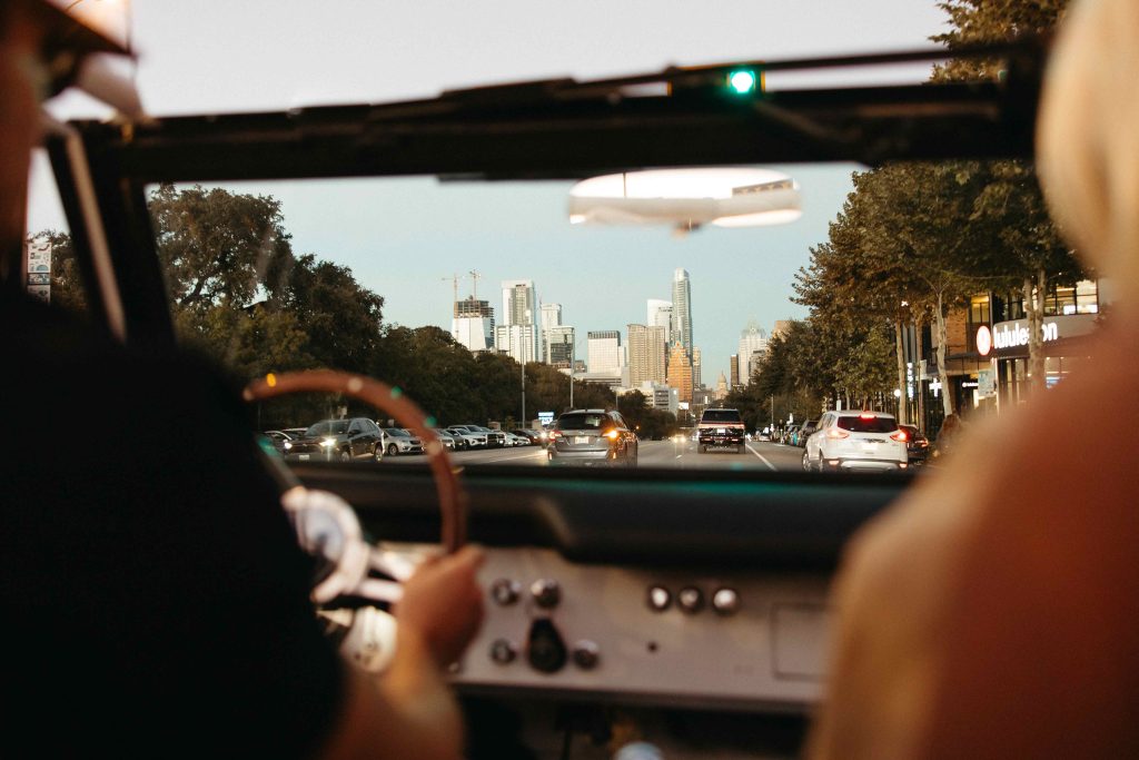 People driving down South Congress, facing downtown Austin
