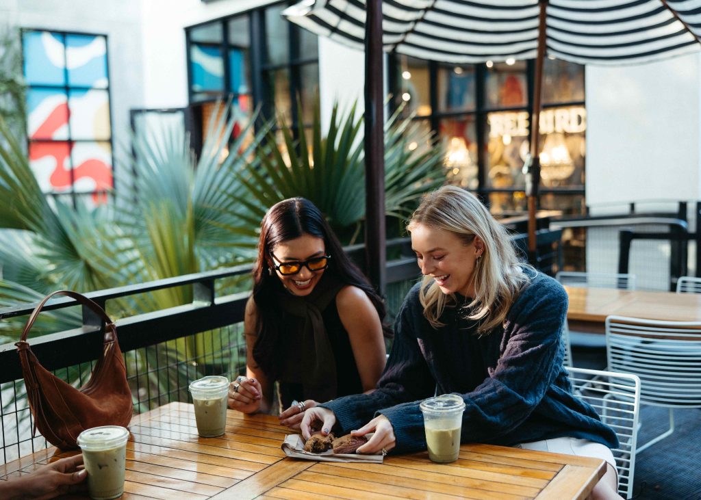 Two women eating breakfast together