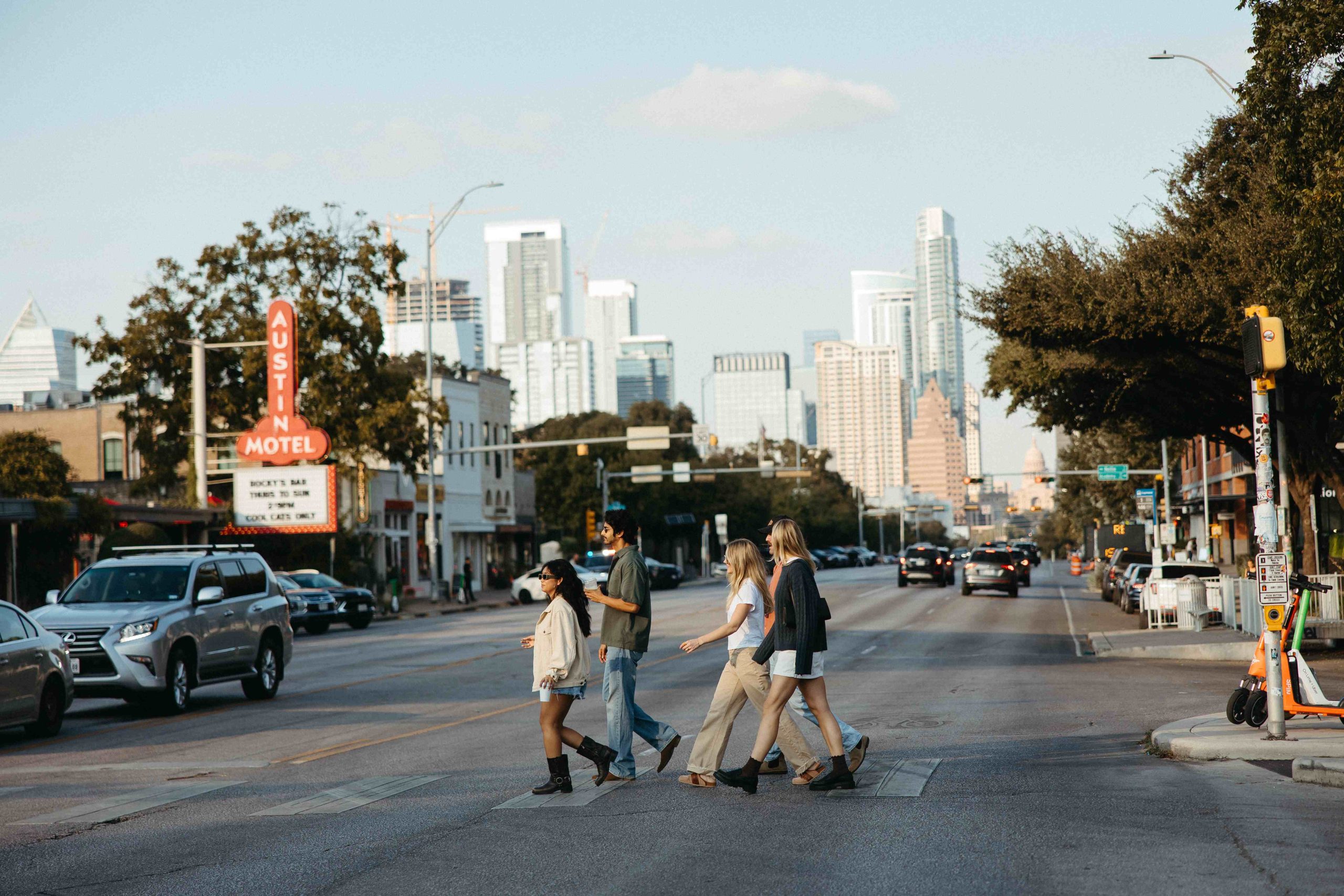 People walking across the road on South Congress