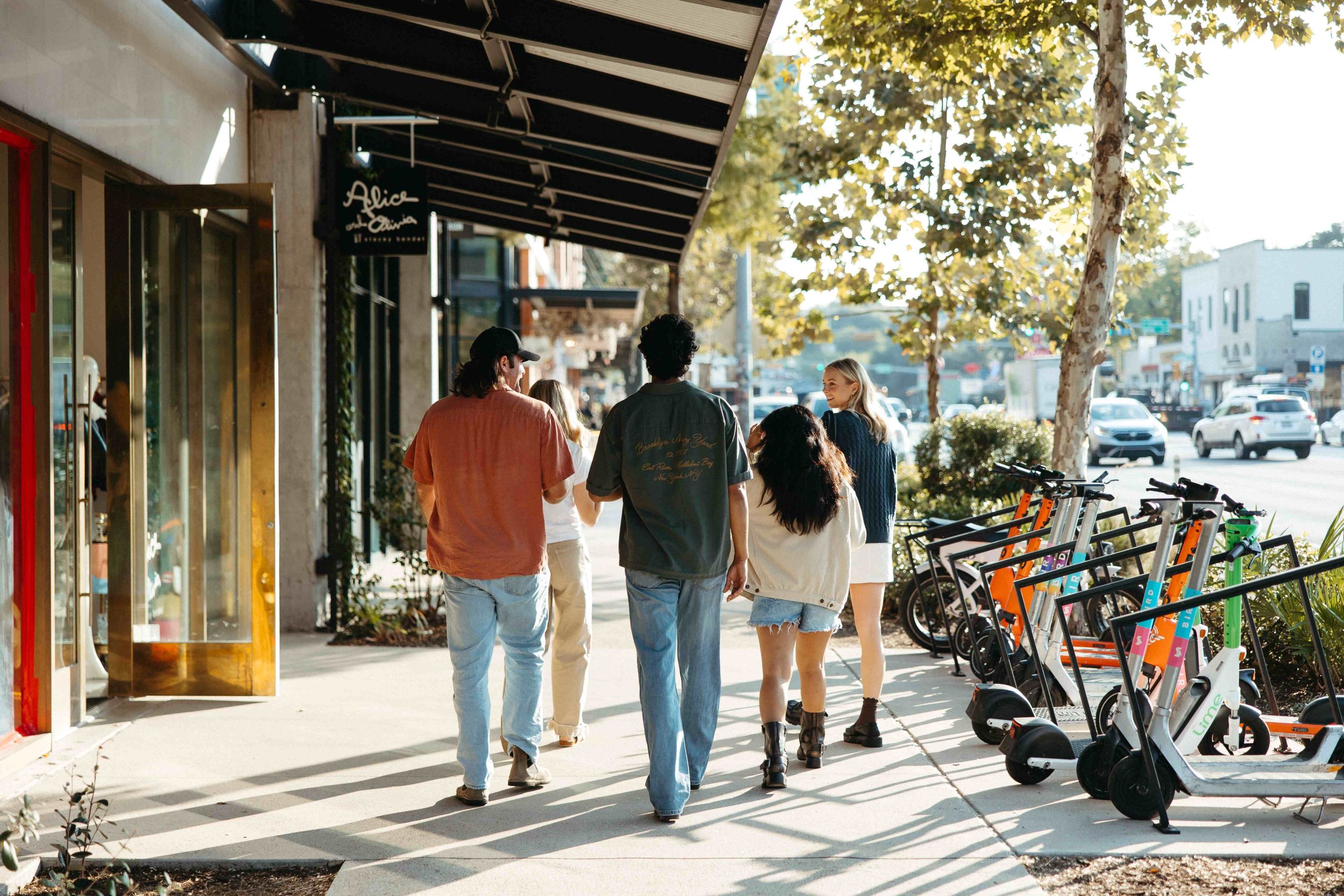 Group of people walking down South Congress