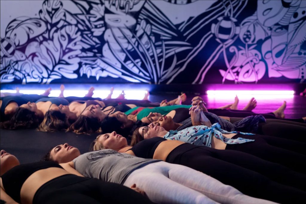 Students lying down at Black Swan Yoga