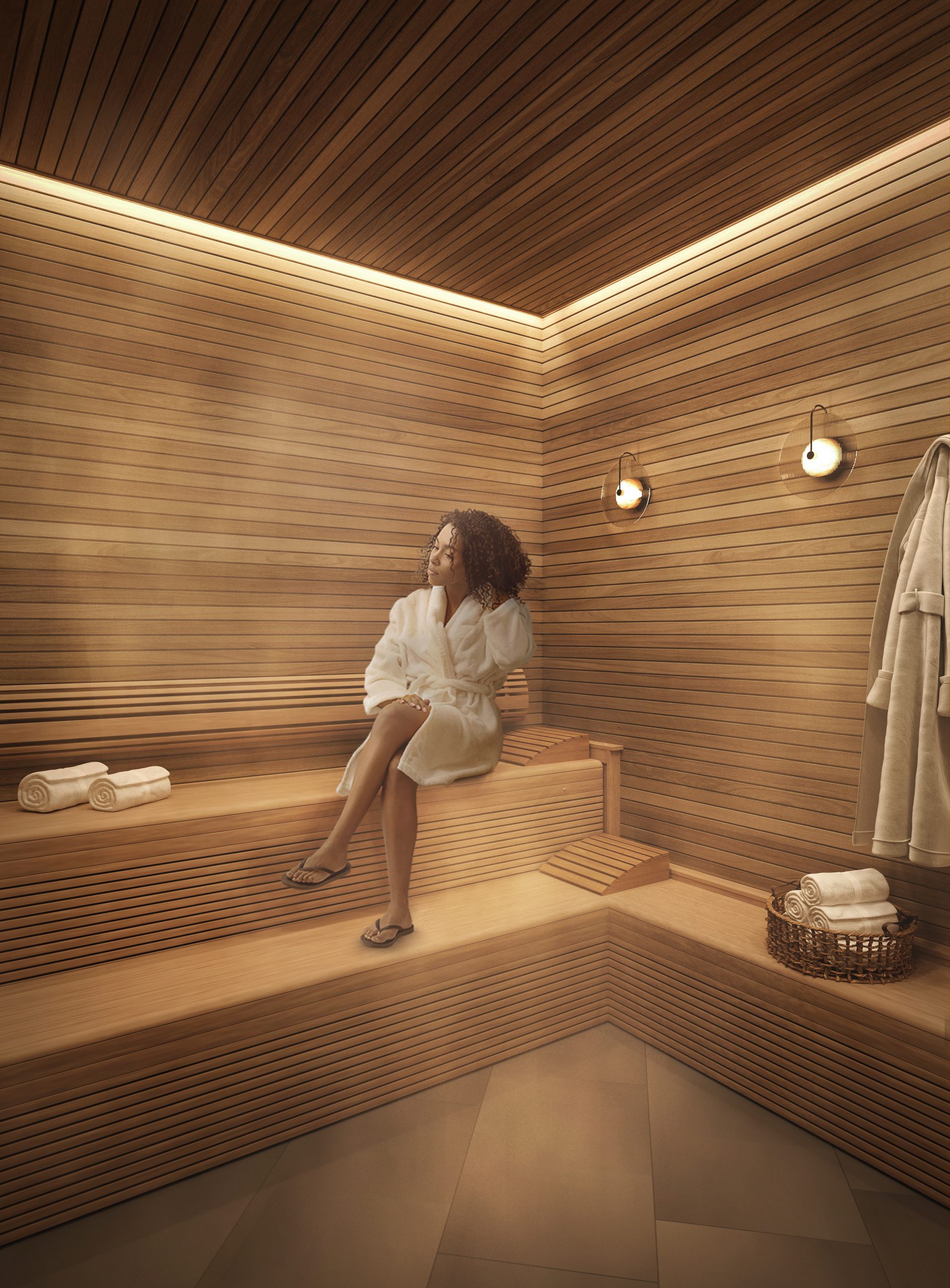 Woman sitting in sauna