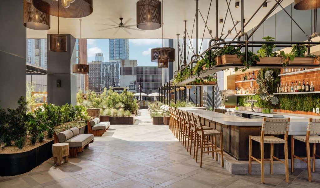 Pool deck and restaurant at Sienna at the Thompson, apartments in downtown Austin.