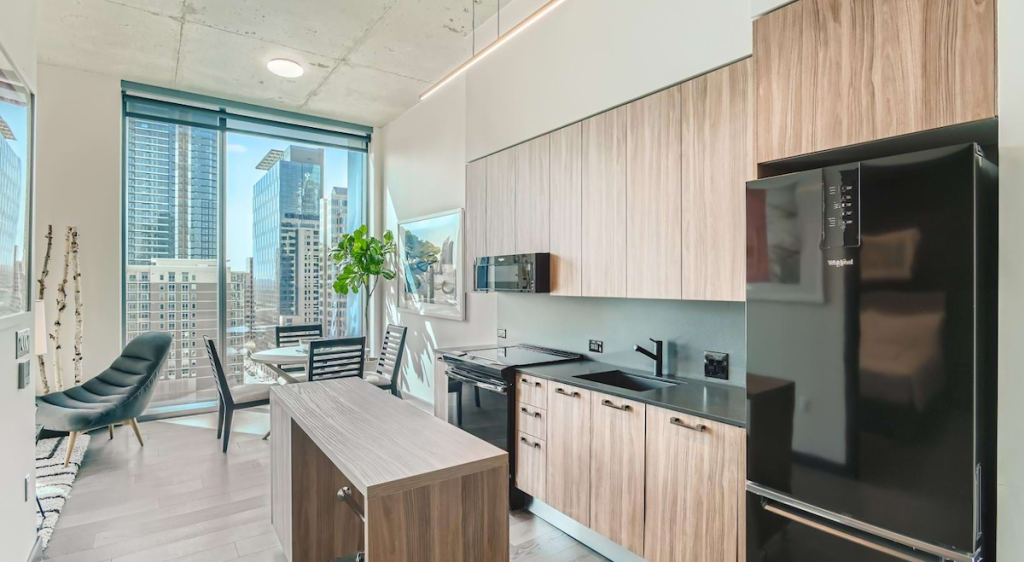 Living room and kitchen at Sienna at the Thompson, downtown Austin luxury apartments.