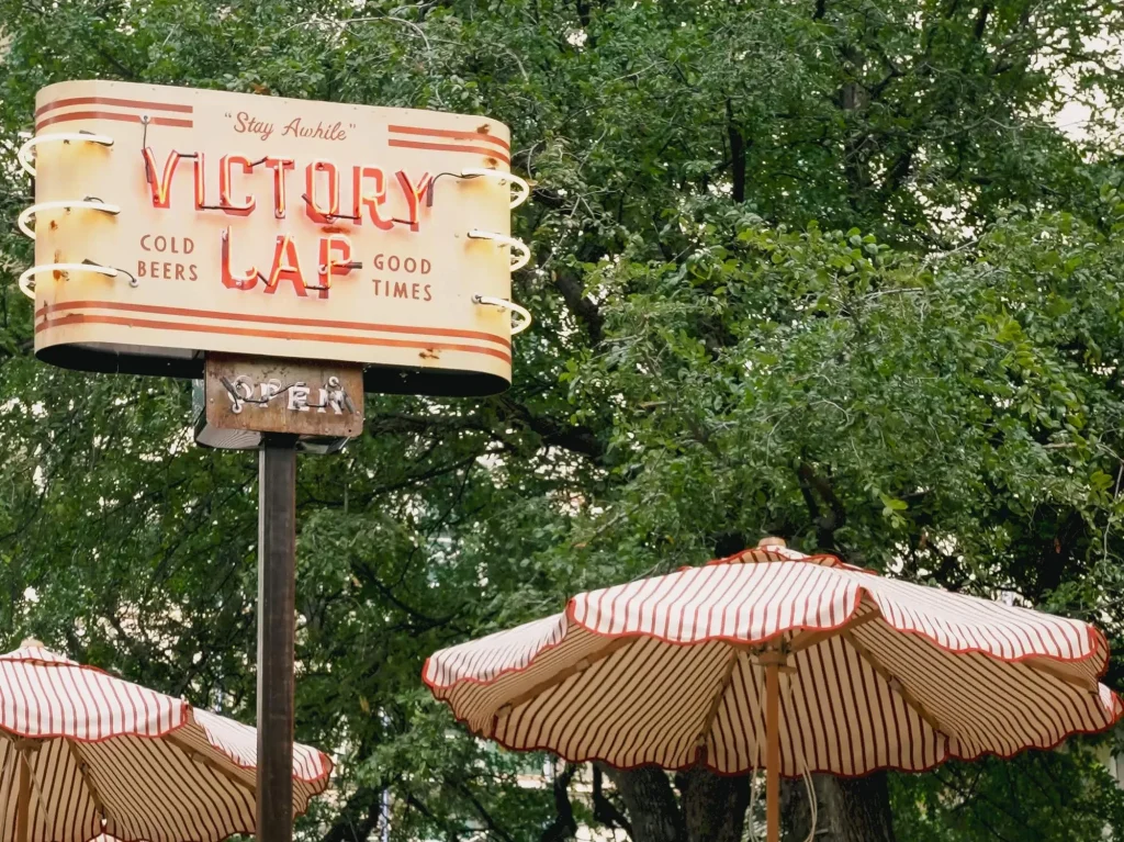 An exterior image of Victory Lap, a Downtown Austin Bar perfect for Day Drinking.