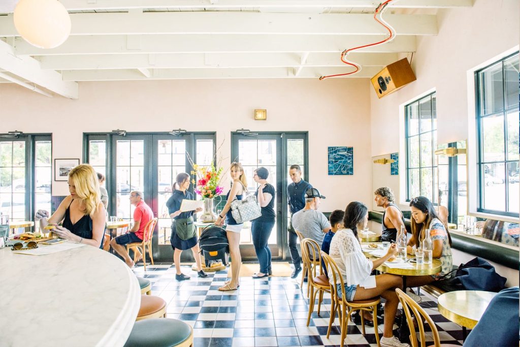 Interior image of June’s All Day café, a café known as one of the best brunch spots in Downtown Austin, Texas.


