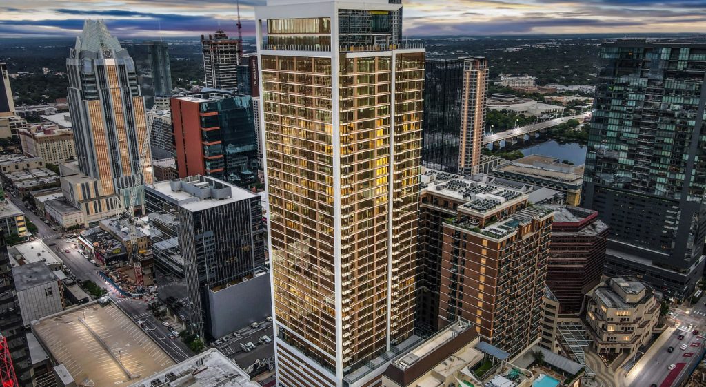 Aerial view of Hanover Republic Square, a high-rise luxury apartment building in downtown Austin, Texas.
