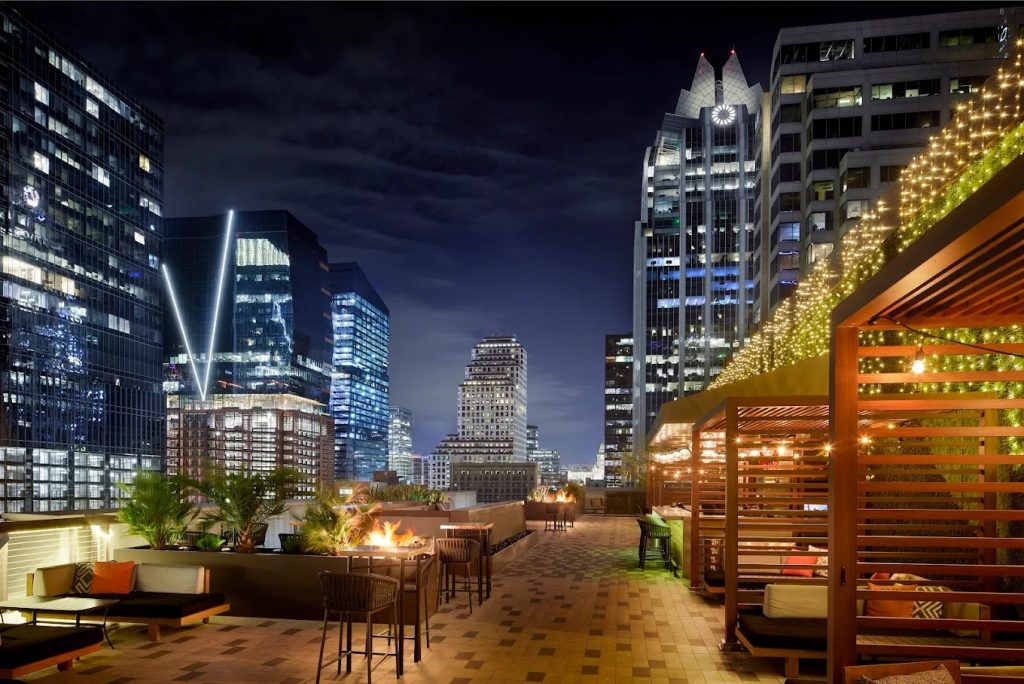 Rooftop views and signature drinks at Edge Rooftop, a stylish Austin cocktail bar near Paseo.