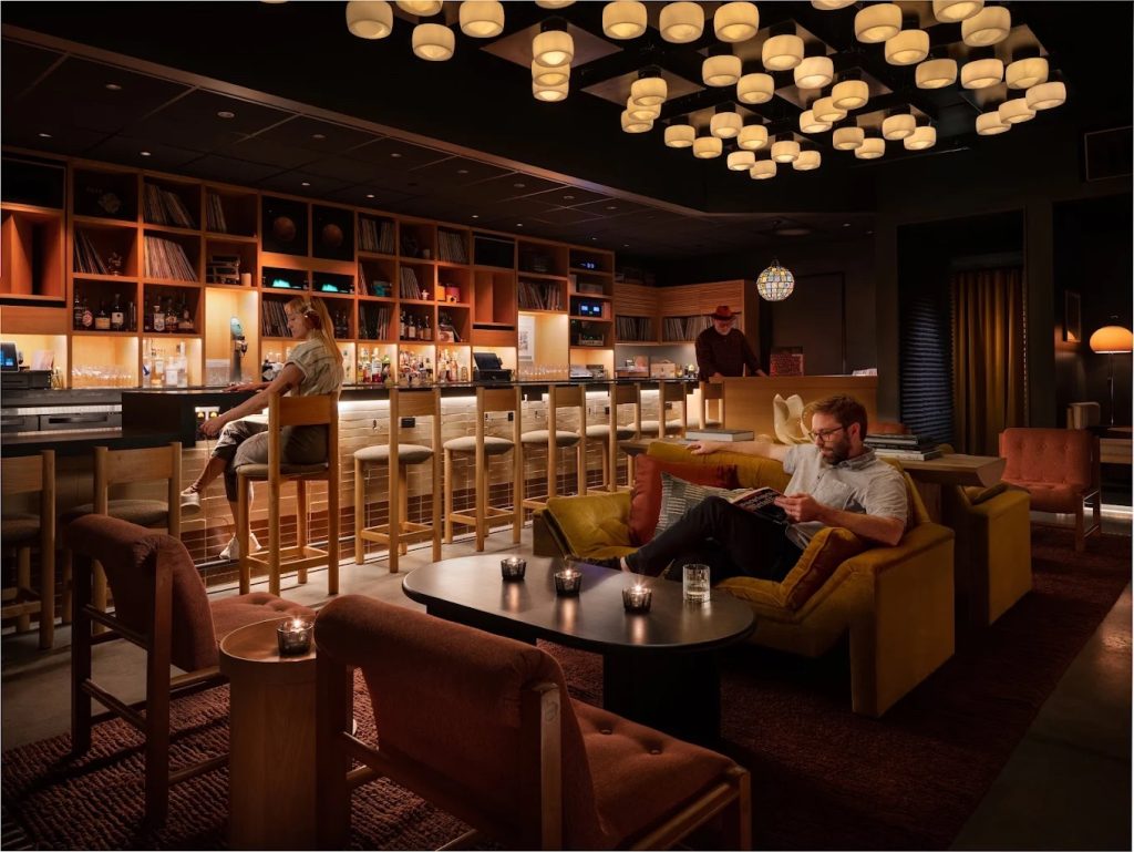 Vinyl-inspired cocktail lounge interior at Equipment Room, a unique downtown Austin cocktail bar.