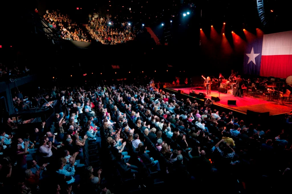 Audience at ACL Live at the Moody Theater in downtown Austin watching a concert on stage.
