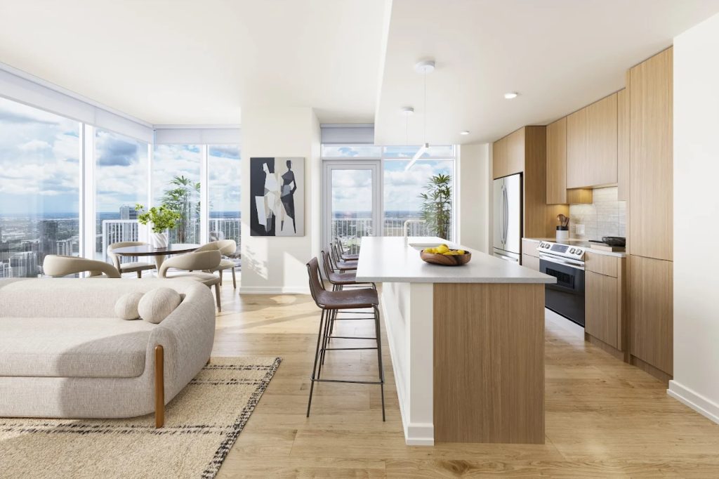 ATX Tower apartment living room and kitchen with floor-to-ceiling windows in downtown Austin.